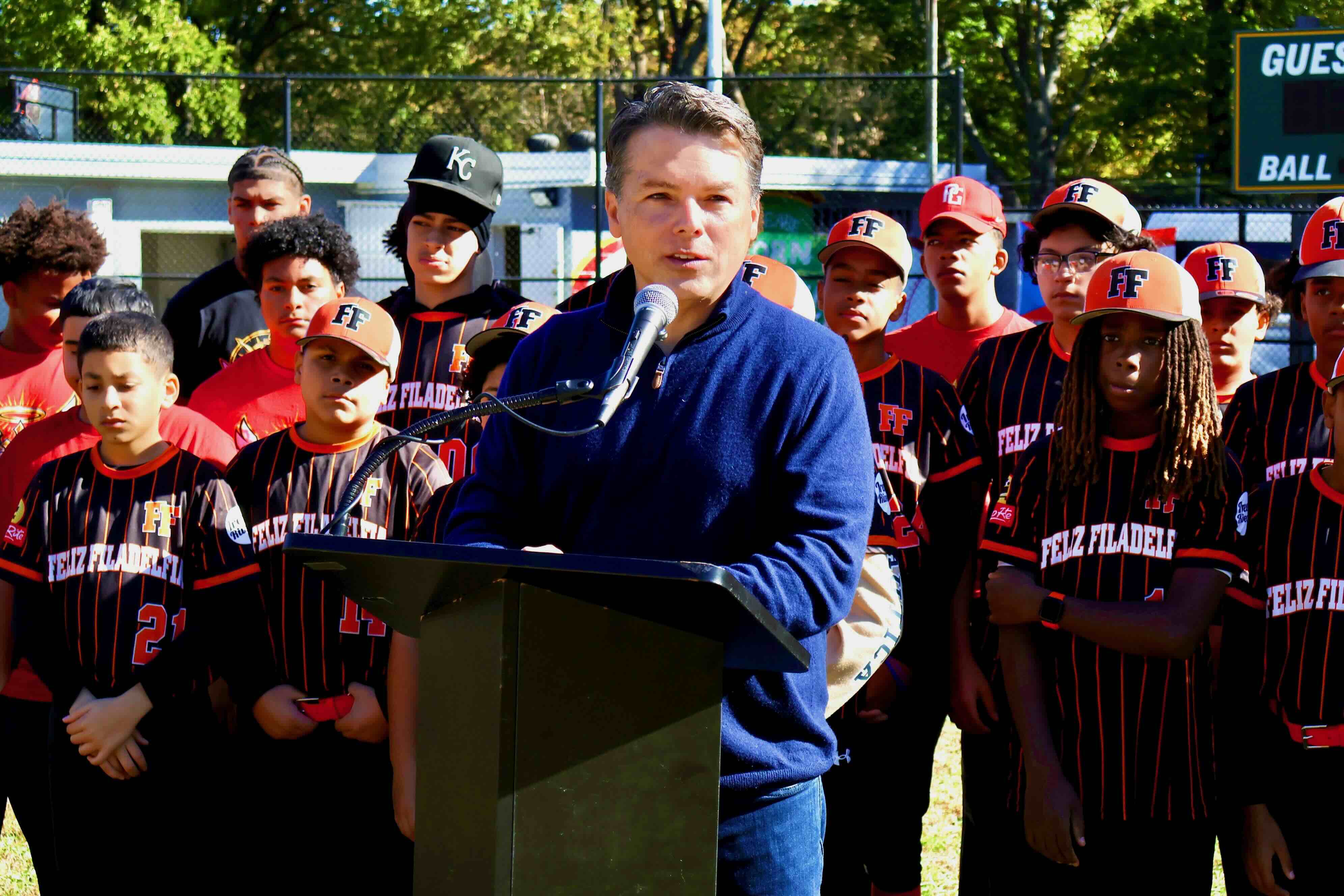 repboylespeaksinfrontofbaseballteam