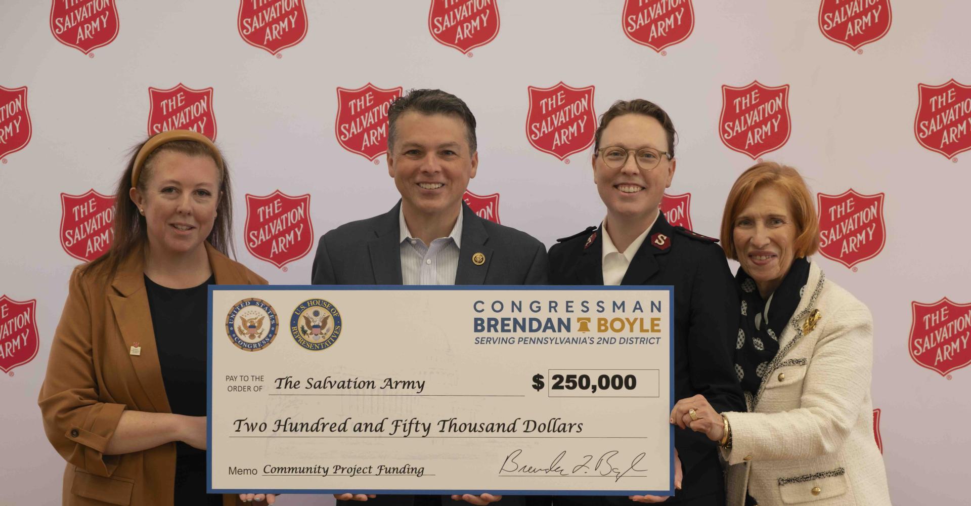 zoomedoutboylepresentschecktosalvationarmy