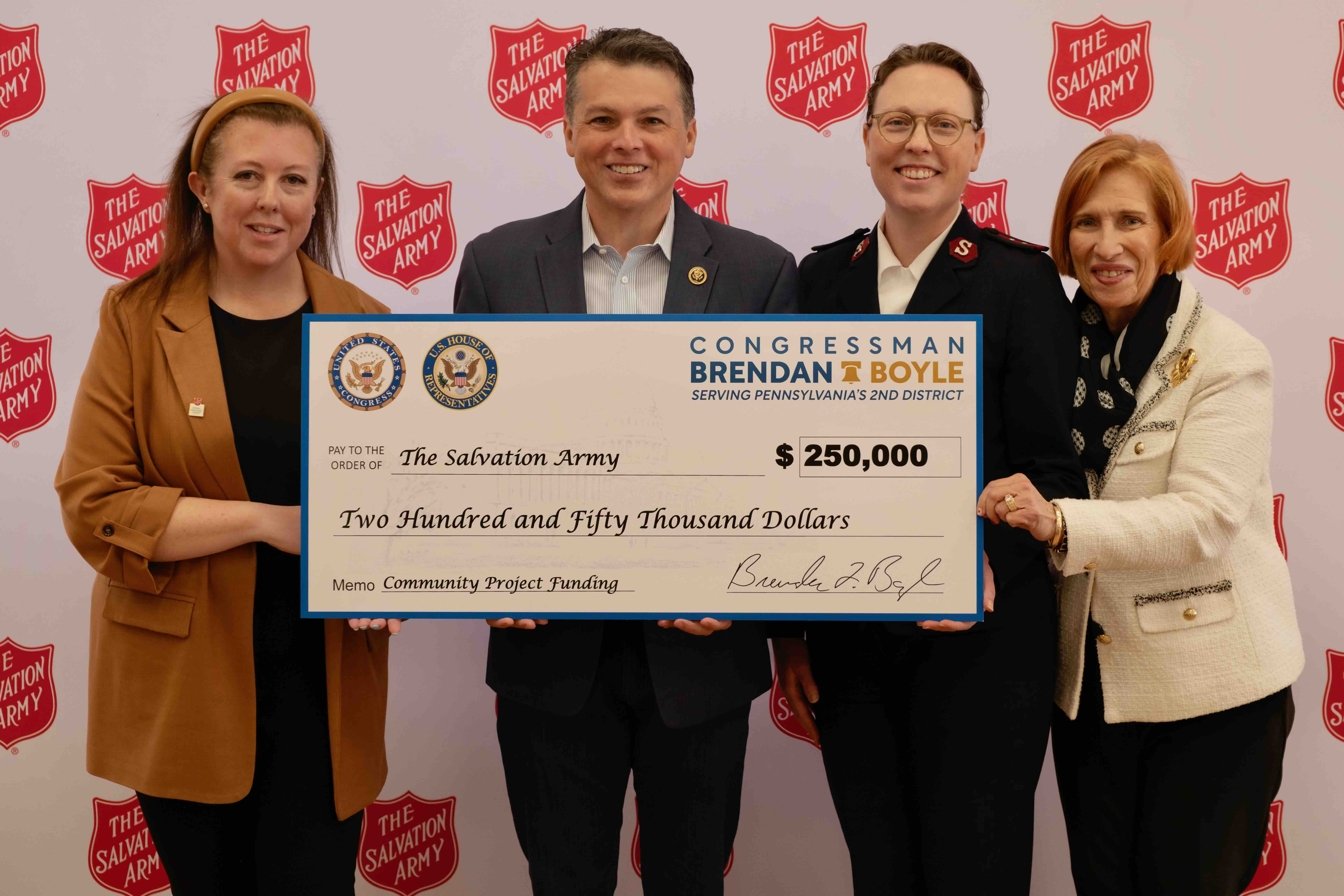 repboylepresentscheckatsalvationarmy